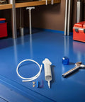 Beavorty Manual Fluid Extractor Pump Portable Plastic Transfer Kit For Car Oil Change With dual extraction tools on a workbench.