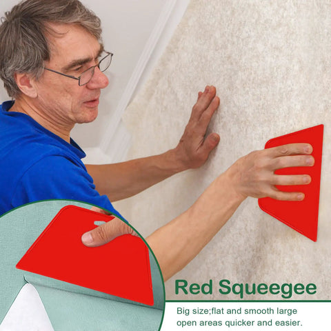 Man using red squeegee from Wallpaper Smoothing Tools Kit With Squeegee Smoother Seam Roller And Brush Pro Grade for wall