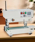 Continuous Band Sealer Machine With Digital Temperature Control 600W Carbon Steel Build on tabletop in a workshop setting