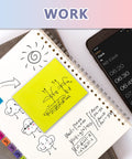 Seven Size Sticky Notes And Tabs Set With Multicolor Neon Index Tabs And Divider Notes For Office School Planner And Book Marking A 710 Piece Bulk Pack To Keep You Organized For Home And Office Use on a diary next to a smartphone