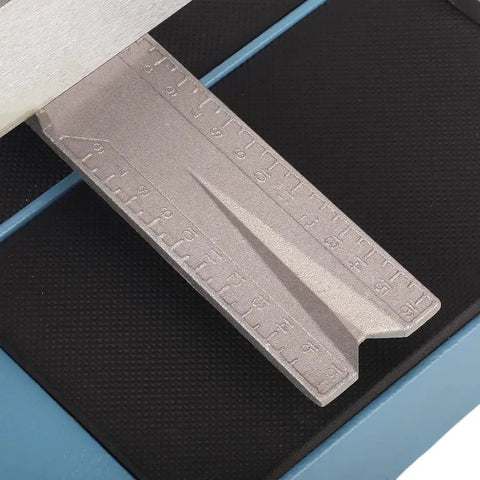 Close-up of the Beast Pro Grade Manual Tile Cutter For Porcelain And Ceramic Tiles 21 Inch with marked cutting guide