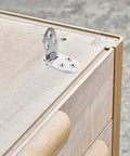 Mounted Six Piece Zinc Alloy Folding Flip Hinge on wooden cabinet, showcasing pre-drilled holes for DIY cabinets and flip desks.