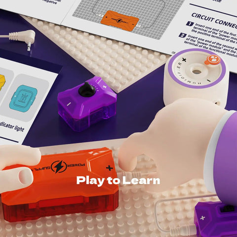 Hands assembling Electric Circuit Kit For Kids With Over 380 Hands On Projects STEM Electronics Toy For Boys And Girls.
