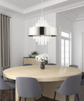 Sleek 10 Light Polished Nickel Pendant Chandelier Featuring Clean Drum Shade And Sparkling Clear Crystal Rods To Bring Major Luxe Vibes To Your Awesome Home, hanging above a round wooden dining table.
