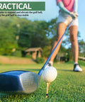 Close-up of a golf club hitting a ball on a 500 Pcs Bamboo Golf Tees 3-1/4 Inches Long Wooden Tees For Golf Practice with blue stripes
