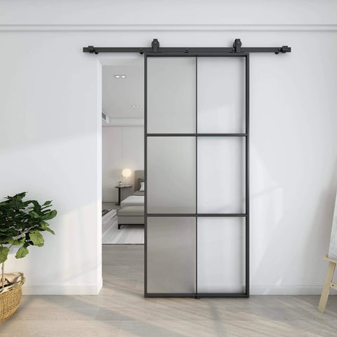 6 Ft Sliding Barn Door Hardware Kit With Top Mounted Track For Aluminum Glass Doors installed in a bedroom, matte black finish.