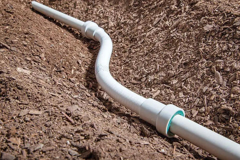 One Inch PVC Lock Flexible Repair Coupling For Schedule 40 PVC Pipe No Glue Quick Install with stainless teeth installed outdoors