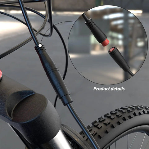 Close-up of durable waterproof 2 pin brake lever connector for electric bikes and scooters, shown near handlebar and wheel.