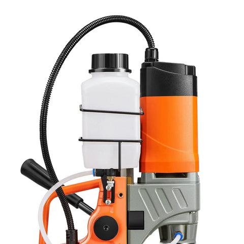Top Shelf Heavy Duty Magnetic Drill Press With Gutsy 1450W Motor showing coolant container and control components for steel drilling.