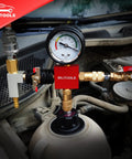 Front view of red BILITOOLS coolant pressure tester attached to a car radiator with brass fittings and gauge.