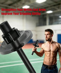 Man using Multi Functional Game Changing Wrist Strength Trainer For 2 Inch Olympic Plates in a gym setting