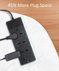 High Power 3000W USB Power Strip With Four USB Ports Including One USB C, showing outlets and plug space on a table.