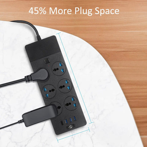 High Power 3000W USB Power Strip With Four USB Ports Including One USB C, showing outlets and plug space on a table.