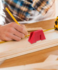 Person using tape measure and pencil on wood with 12 Piece Modular Wrench Storage Rack Magnetic Tool Holder Organizer Tray visible