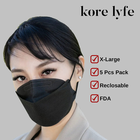 Person wearing Ten Pack Extra Large Black KF94 Face Masks With Premium Filtration And Comfortable Breathability Made In Korea In Five Pack Reclosable Zip Lock Pouches For Easy On The Go Protection, text highlights features X-Large, 5 Pcs Pack, Reclosable, FDA.