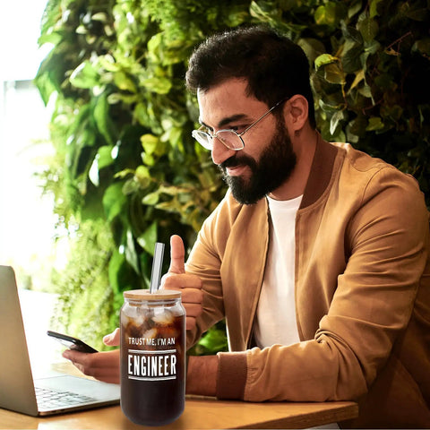 Man with beard using laptop and Engineer Mug For Him A Funny Gag Gift Durable Glass Cup For Engineers Valentines Day Gift