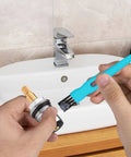 Applying Food Grade Silicone Lubricating Plumber Grease For Waterproof Faucets And O Rings with brush near bathroom faucet