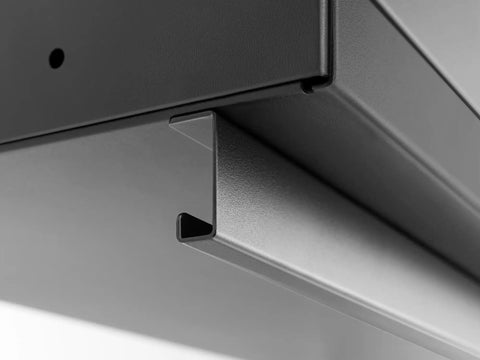 Close-up of heavy duty fully welded steel shelf edge from Heavy Duty 15 Piece Garage Cabinet Set Features Fully Welded Steel Shelves.