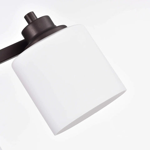 Close-up of frosted etched glass on Solbi Contemporary 4 Light Oil Rubbed Bronze Bath Vanity Fixture 33 Inch Wide