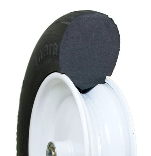 Cross-section view of No Flat Universal Fit Wheelbarrow Tire And Wheel Assembly with solid polyurethane foam