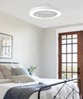 Bladeless Flush Mount Ceiling Fan With Light And Remote Control 19 Inch Low Profile installed in a bedroom ceiling.