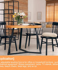 Dining room setup with round table and chairs, showcasing application of Four Pack Round Tube Leveling Feet Inserts With M6 Thread.