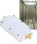 Professional Grade Programmable Signal Conditioner Featuring A No Sweat Setup Aluminum Alloy Housing And Rock Solid Performance Tuned For Pros Seeking Sweet Stable Transmission 820 To 970 Mhz in a silver color with elevator backdrop.