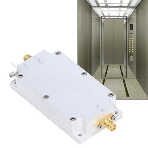 Professional Grade Programmable Signal Conditioner Featuring A No Sweat Setup Aluminum Alloy Housing And Rock Solid Performance Tuned For Pros Seeking Sweet Stable Transmission 820 To 970 Mhz in a silver color with elevator backdrop.