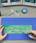 Using 928D IV Pro Grade All In One Soldering Iron Kit With Type C Port Fast Heating C235 Cartridge on circuit board