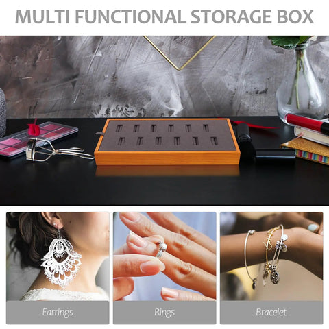 Slick Gray Solid Wood Jewelry Display Tray Featuring 12 Ring Slots on a black table with accessories.