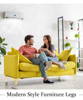 Gold 4 Inch Metal Furniture Leg Set 12 Pack Replacement Feet For Table Cabinet Sofa Dresser Couch Cupboard Chairs Ottoman Includes 48 Screws And Triangle Mount shown on yellow sofa in modern living room