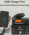 Beefy 13.8V 30A DC Power Supply with Cigarette Plug Socket powering ham CB radio and charging phone via USB port.