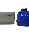 Lightweight Daypack For Hiking And Camping In Bold Blue 11 By 9 By 10 Inches beside cardboard packaging box