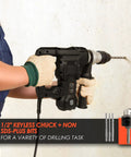 Heavy Duty 1 1/4 Inch SDS Plus Rotary Hammer Drill With 13 Amp Motor Four Function Demolition Hammer in use on concrete wall