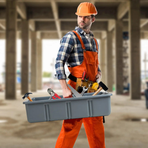 Worker holding Heavy Duty Multiuse Tote Tray With Six Dividers For Organizing Your Garage Tools Cleaning Supplies And Plumbing Gear