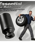 Heavy Duty 32mm Socket Featuring Half Inch Drive And 12 Point Impact Design held by a mechanic with a tire, highlighting durability and size.
