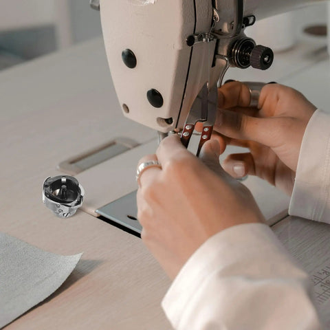 Pro Grade Metal Rotary Hook Sewing Machine Part For Flat Bed Industrial Machines With Advanced Computer Control And Precise Stitching Performance Dark Bobbin Case Accessory Designed For Heavy Duty Bulk Apparel Production And Home Use on industrial sewing machine