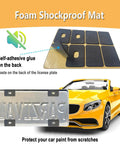 Foam shockproof mat with self-adhesive backing for license plate protection on a yellow convertible car.