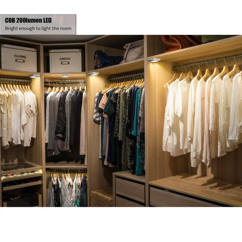 Super Bright Battery Operated Closet Light 200 Lumen COB LED Tap Lights illuminating a wooden closet
