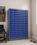 Heavy Duty 75 Drawer Small Parts Organizer For Nuts, Bolts And Tiny Hardware, Rugged Metal Storage Cabinet With 75 Drawers For Garage, Workshop, And Home Use; shown against a white brick wall with blue drawers, tools on the side.