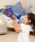 Child playing with Totally Rad Multicolor Micro Helicopter Toy 203307002 indoors, showing durable chopper and realistic rotor sound.