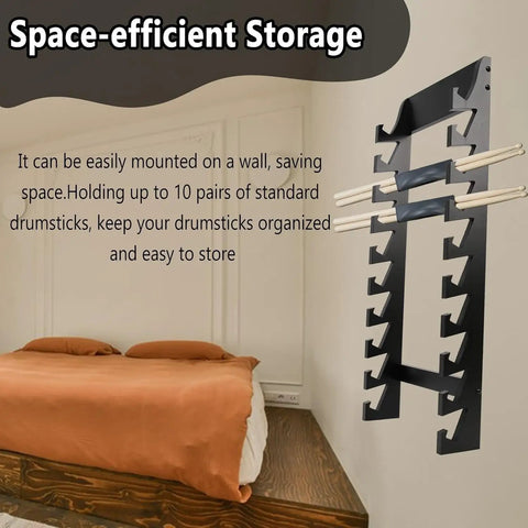 Heavy Duty Black Acrylic Drumstick Holder mounted on wall, space-efficient rack for ten sticks and mallets in bedroom.