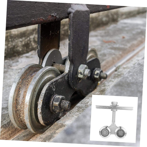 Heavy Duty Sliding Door Track Roller Wheel For Smooth Operation And High Load Capacity Perfect For Industrial Doors Cabinets And Closets Durable Steel Wheel And Track Hardware, close-up view of steel roller installed on track.