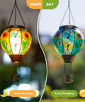 Hot Air Balloon Solar Lantern For Outdoor Use, Dragonfly Inspired Glass Hanging Light For Patio And Garden Decor, night and day view