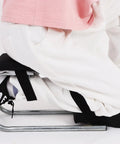 Person kneeling on a Garden Kneeler Seat With Thick Foam Padding And Wearable Knee Support, side view, showcasing lightweight design.