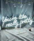 You Are So Pretty Neon Sign Led Light Up Wall Decor Made From Transparent Acrylic For Indoor Use In Living Room Bedroom Office Party Wedding Christmas Gift 29.9 By 13.7 Inches Cool White on display with decorative vases