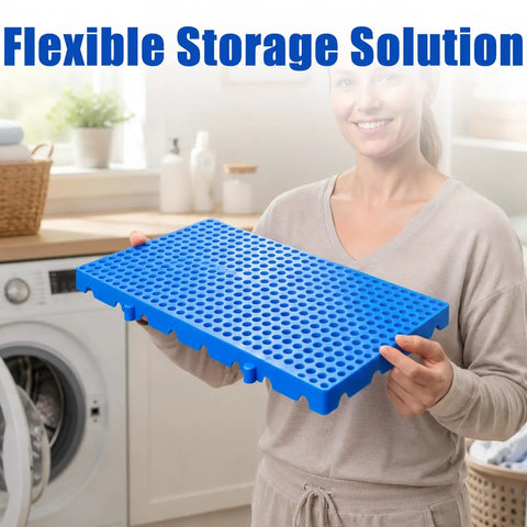Person holding Lightweight Nestable Plastic Pallet Grid Pad For Floor Storage In Balcony Garage And Basement Rooms With Ventilated Open Mesh Surface 11.8 x 23.6 x 1.18 Inches Four Pack Durable Water Resistant