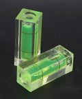 Small Spirit Level Square Bubble Level High Optical Transparency Material in green, showing precision lines for measurement.