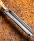 3/4 Inch Spindle Roughing Gouge with ash handle, high speed steel blade on wood table, wood lathe carving tool