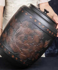 Ceramic Rice Dispenser With Heavy Duty Snap Lid Airtight Bulk Food Storage Container, large black canister with floral design.
